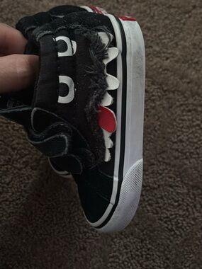 Vans Kids Black Canvas Monster Slip-On Sneakers with Red Accent